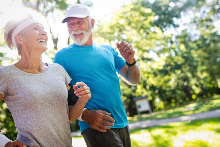 older couple jogging in the park