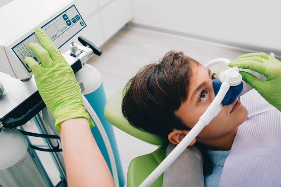 child receiving nitrous oxide sedation at the dentist